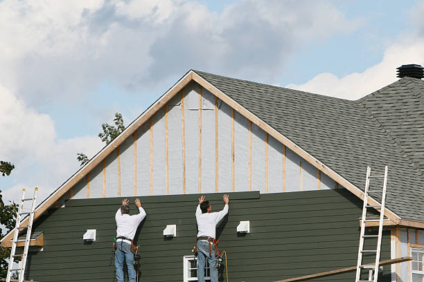Professional Emergency Siding Repair technician working in Homerville, OH
